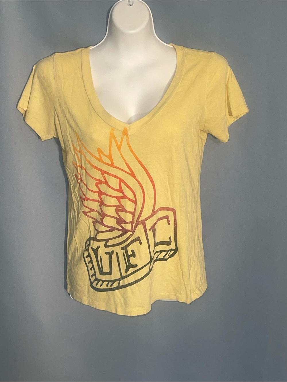 UFC Yellow V-Neck Tee with Wing Graphic